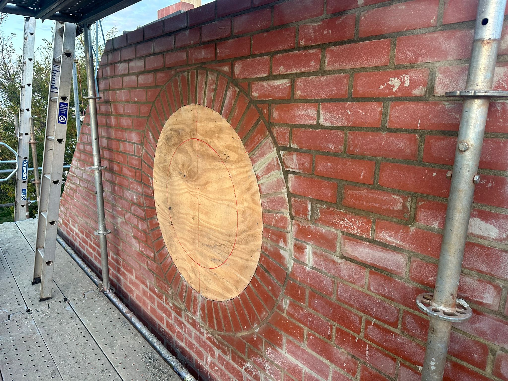Stage 2 of custom circular window design — the feature set out through the wall and gable