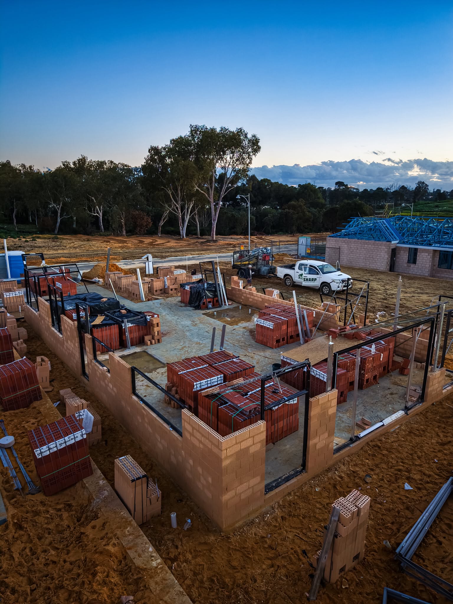 Brick packs and materials set out across a site